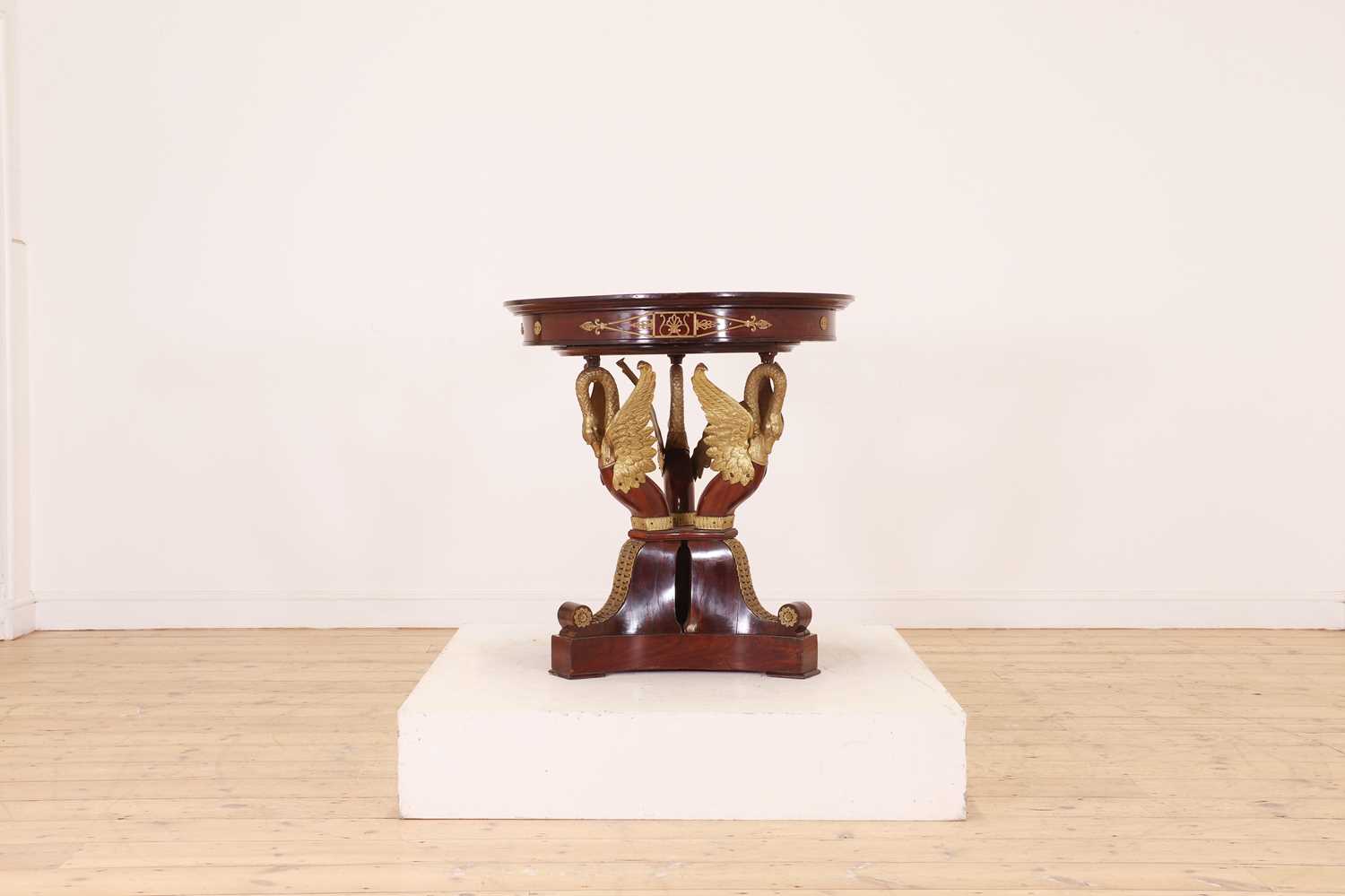 Lot 169 - A mahogany and gilt-metal-mounted guéridon