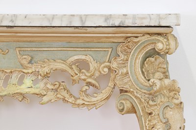 Lot 432 - A carved and painted pine console table