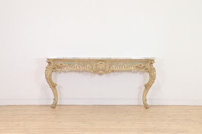 Lot 432 - A carved and painted pine console table