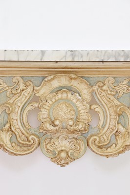 Lot 432 - A carved and painted pine console table