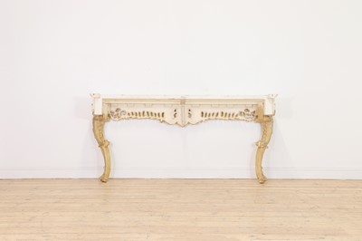 Lot 432 - A carved and painted pine console table