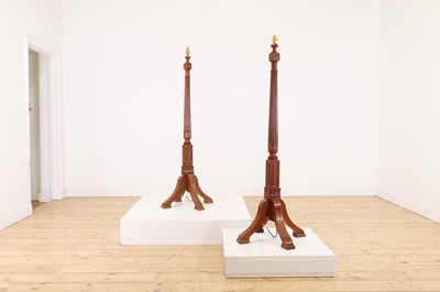 Lot 494 - A pair of mahogany floor lamps