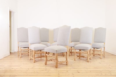 Lot 550 - A set of eight stripped beech dining chairs