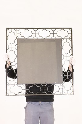 Lot 440 - A pair of modernist brass mirrors