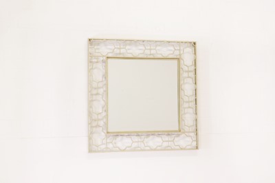 Lot 440 - A pair of modernist brass mirrors