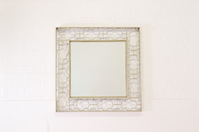 Lot 440 - A pair of modernist brass mirrors