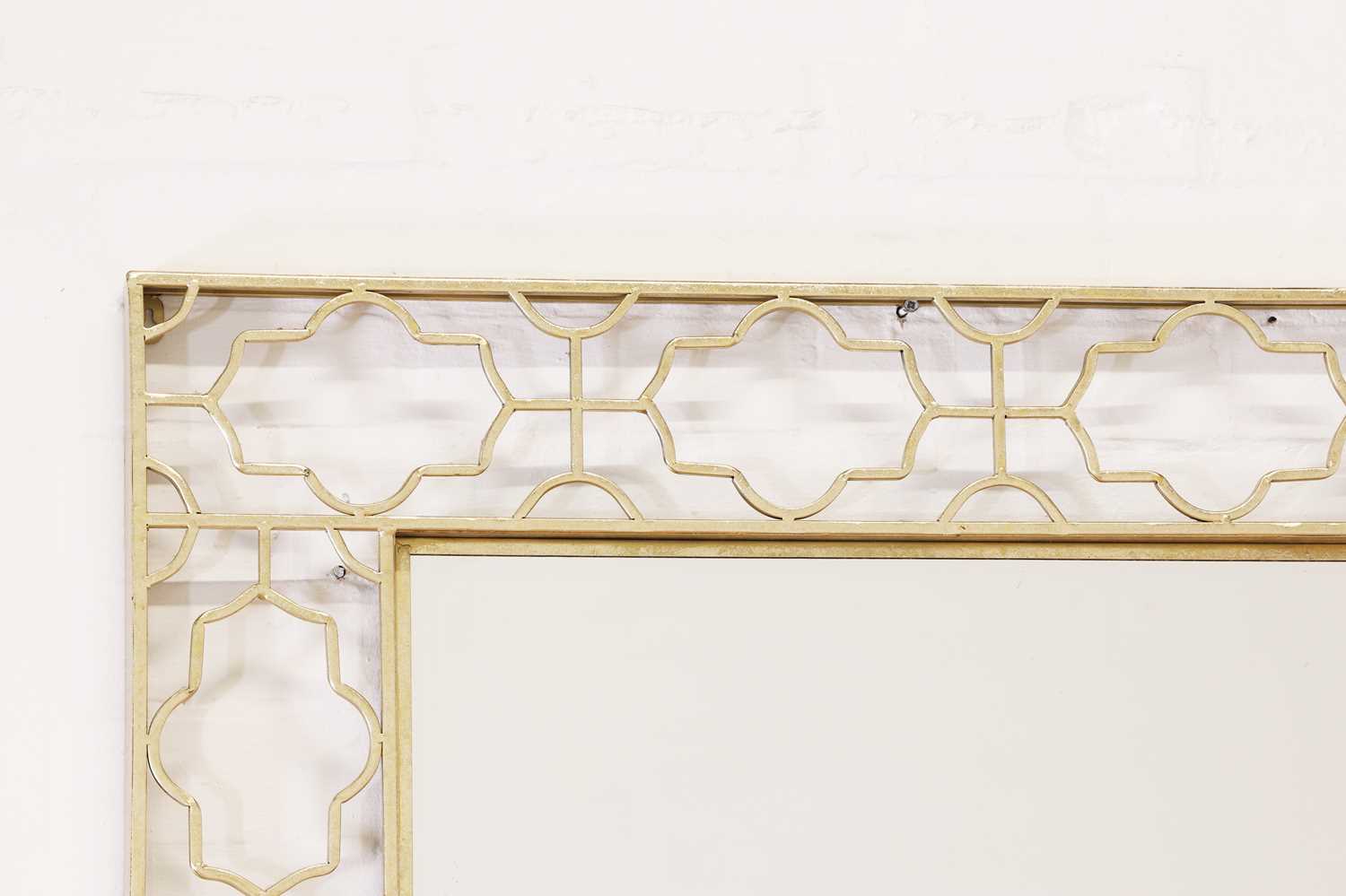 Lot 440 - A pair of modernist brass mirrors