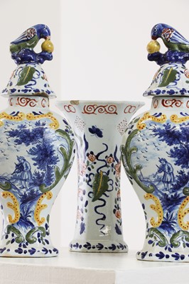 Lot 286 - A delft pottery polychrome part garniture