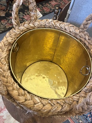 Lot 385 - A woven rush log basket