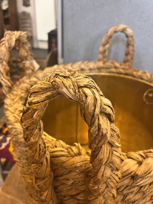 Lot 385 - A woven rush log basket