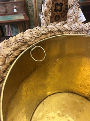 Lot 385 - A woven rush log basket