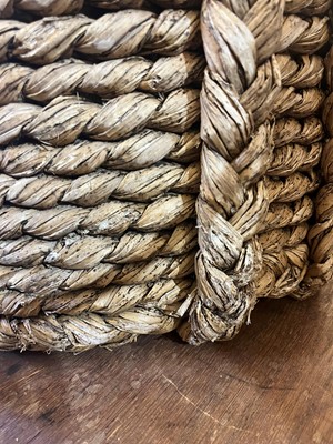 Lot 385 - A woven rush log basket