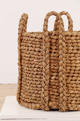 Lot 385 - A woven rush log basket