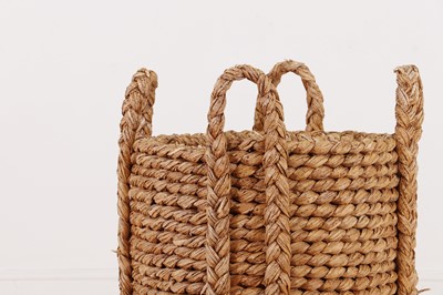 Lot 385 - A woven rush log basket