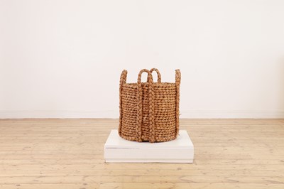 Lot 385 - A woven rush log basket