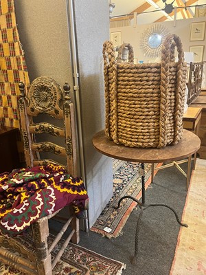 Lot 385 - A woven rush log basket