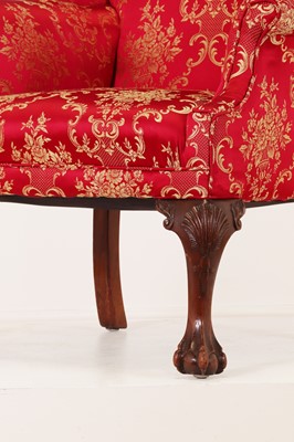 Lot 170 - A George I-style wingback armchair