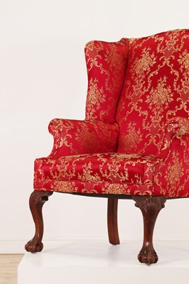 Lot 170 - A George I-style wingback armchair