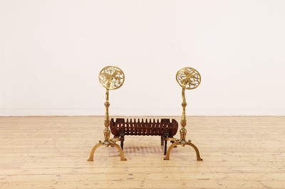 Lot 455 - A pair of brass firedogs