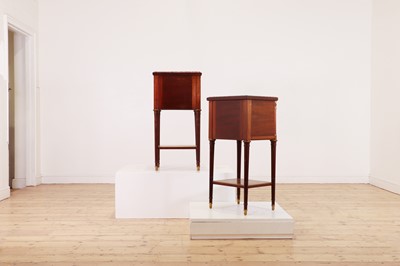 Lot 182 - A pair of Directoire-style mahogany tables de nuit