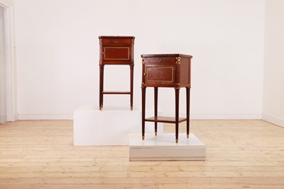 Lot 182 - A pair of Directoire-style mahogany tables de nuit
