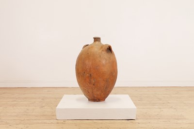 Lot 370 - A terracotta oil pot