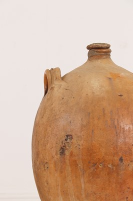 Lot 370 - A terracotta oil pot
