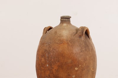 Lot 370 - A terracotta oil pot