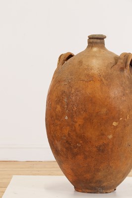 Lot 370 - A terracotta oil pot