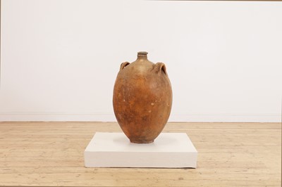 Lot 370 - A terracotta oil pot