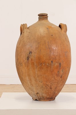 Lot 370 - A terracotta oil pot