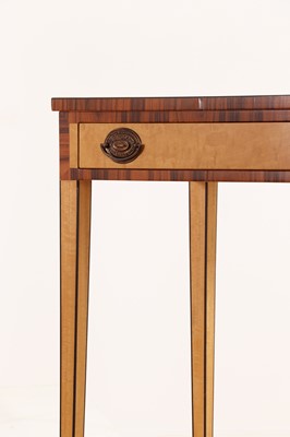 Lot 196 - A pair of George III-style satinwood and coromandel side tables