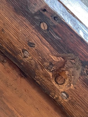 Lot 488 - A mahogany triangular tea table