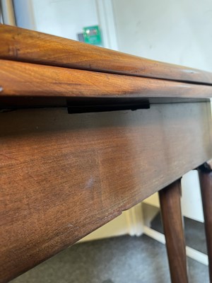 Lot 488 - A mahogany triangular tea table