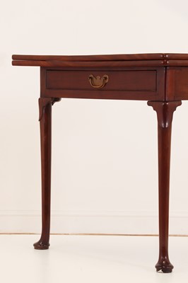 Lot 488 - A mahogany triangular tea table