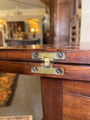 Lot 488 - A mahogany triangular tea table