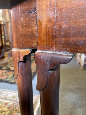 Lot 488 - A mahogany triangular tea table