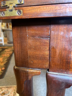 Lot 488 - A mahogany triangular tea table