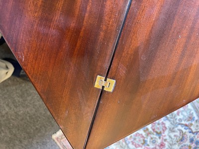 Lot 488 - A mahogany triangular tea table