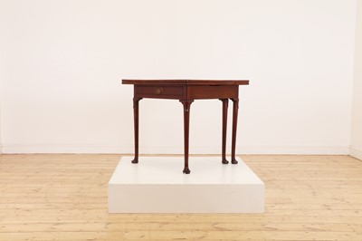 Lot 488 - A mahogany triangular tea table