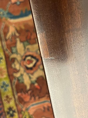 Lot 488 - A mahogany triangular tea table