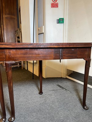 Lot 488 - A mahogany triangular tea table