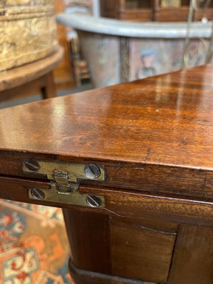 Lot 488 - A mahogany triangular tea table