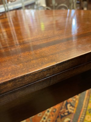 Lot 488 - A mahogany triangular tea table
