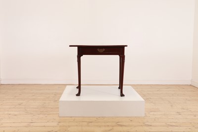 Lot 488 - A mahogany triangular tea table