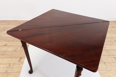 Lot 488 - A mahogany triangular tea table