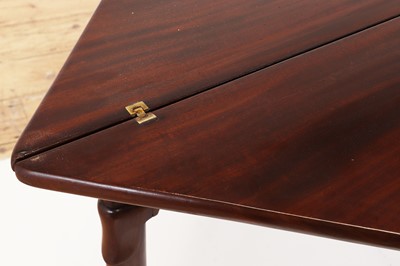 Lot 488 - A mahogany triangular tea table