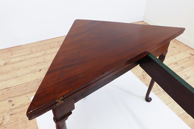 Lot 488 - A mahogany triangular tea table