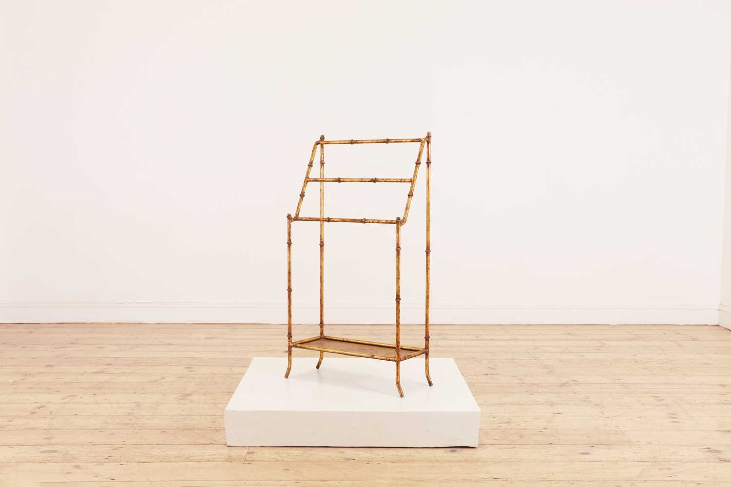 Lot 84 - A small gilt-metal towel rail