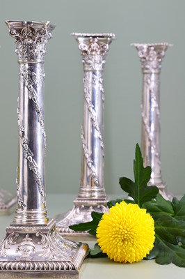 Lot 116 - A composed set of six Edwardian silver candlesticks
